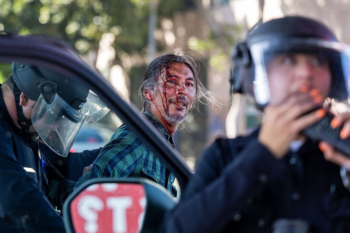 LA Raids: National Guard & Trump Response A detainee during protests.